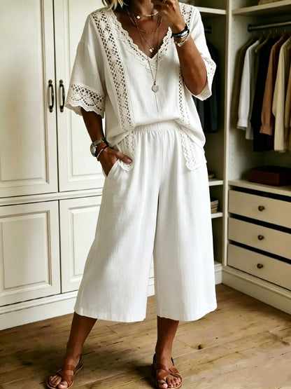 V-neck hollowed-out lace short-sleeved top and capri shorts two-piece set